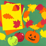 DIY fall crafts with pumpkin, apple, and leaf cutouts—ideal for crafting pumpkin art projects and fall decorations.