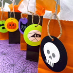 Halloween craft ideas for kids—craft spooky decorations and Halloween activities for preschoolers with paper cutouts.